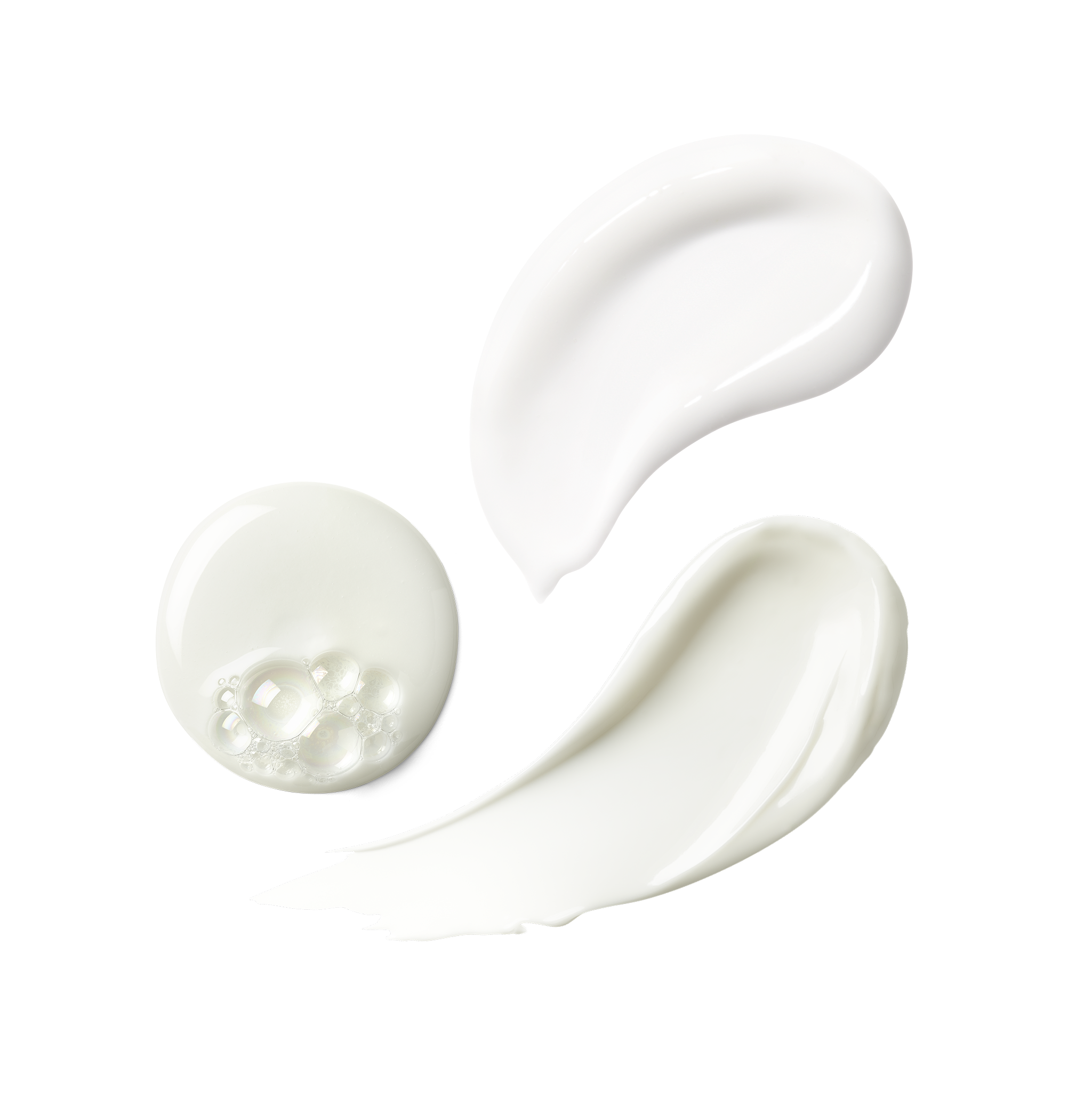 Close-up of three white skincare product textures shown as swatches.