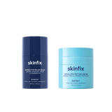 Two skincare products from skinfix on a transparent background: a dark navy blue Dermatitis Relief Balm and a light blue Triple Lipid-Peptide Cream.