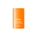 Orange skincare serum container with 'skinfix' branding on a white background