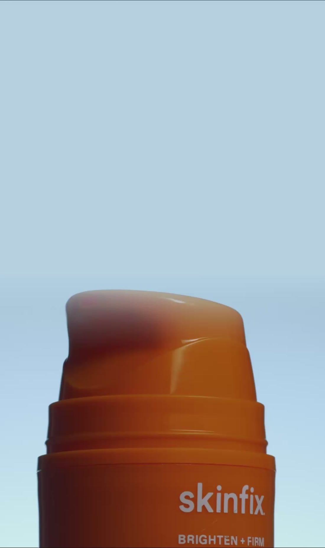 Video of Skinfix Brighten + Firm 15% Vitamin C Serum rotating with "NEW" badge